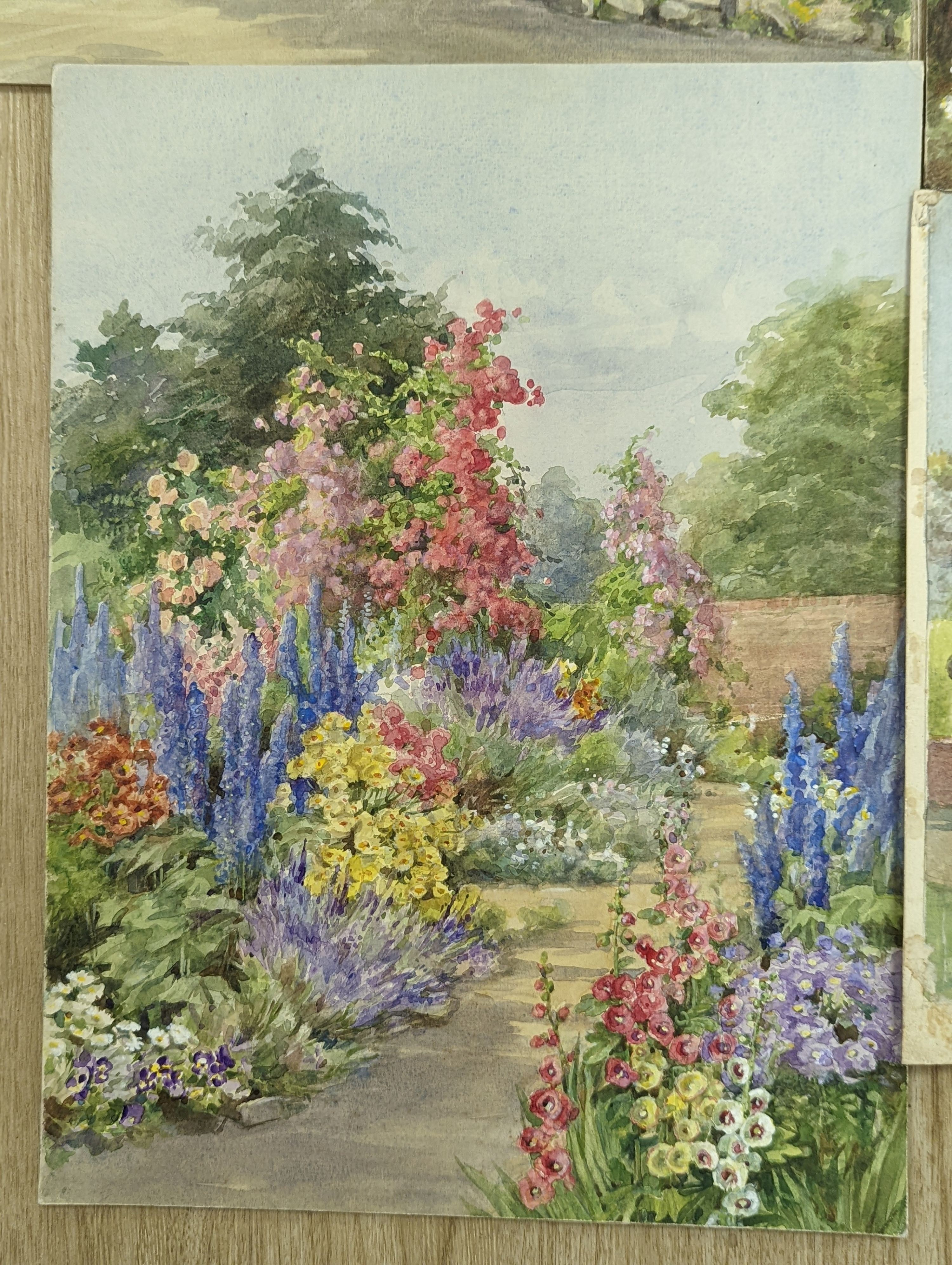 Edith Alice Andrews (1900-1940), four watercolours; Late Summer, cottages and blossom, In A Sussex Garden & herbaceous borders, signed, largest 29 x 39cm.